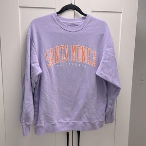 Hollister crewneck, size xs, and in a periwinkle purple color.